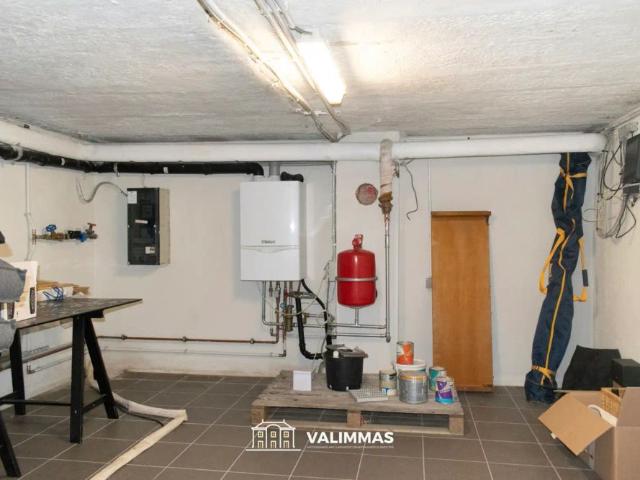 Een magnifiek gelegen driegevelwoning met mooie tuin.