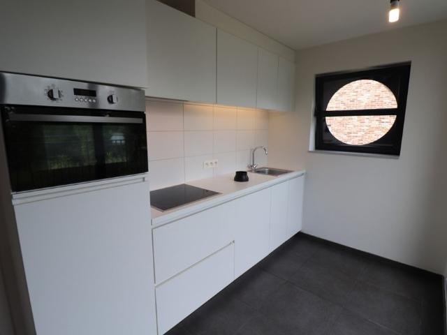 Een recent duplexappartement op de tweede en op de dakverdieping met terras en garage