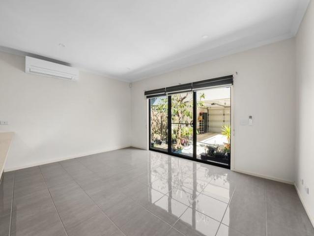 Effortless & Modern 2 Bedroom Living with Rear Garage Access