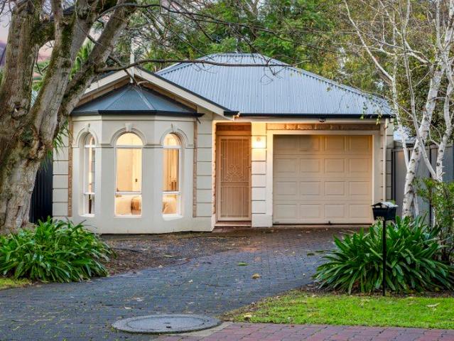 Effortless Modern Living in a Peaceful Parkside Setting