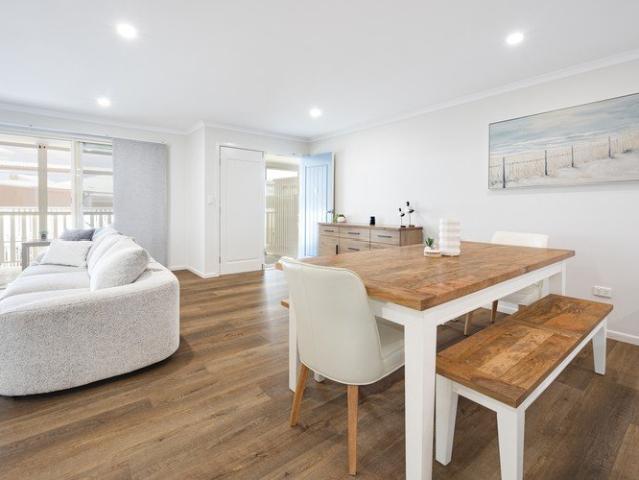 MUST BE SOLD, OWNERS COMMITTED ELSEWHERE! FULLY RENOVATED UNIT WALK TO BEACH!