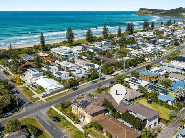 Effortless Coastal Living, Just One Street from the Beach