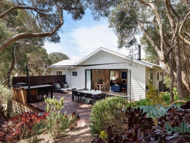 Effortless coastal living steps from 16 Beach!