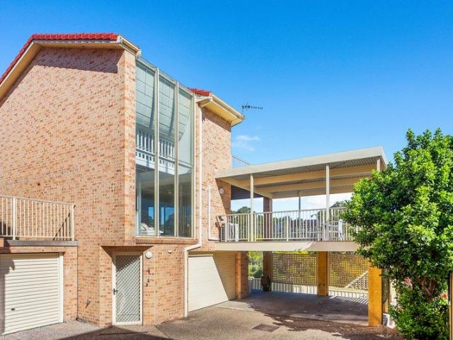 Effortless Coastal Living with Exceptional Storage & Parking