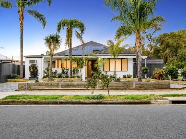 Effortless Coastal Style & Updated Resort Style Living
