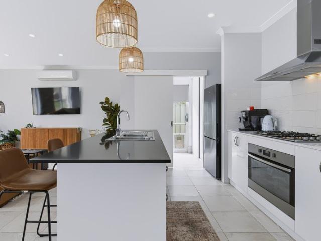Effortless Family Flow: Sun Soaked Living, Side Access