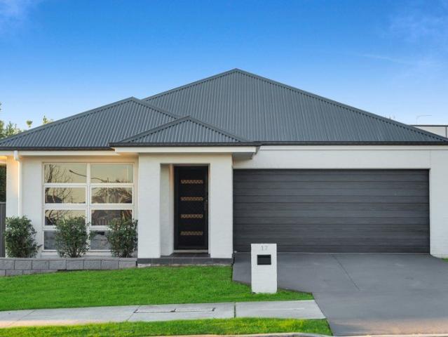 Effortless family living with side access in prestigious Emerald Hills