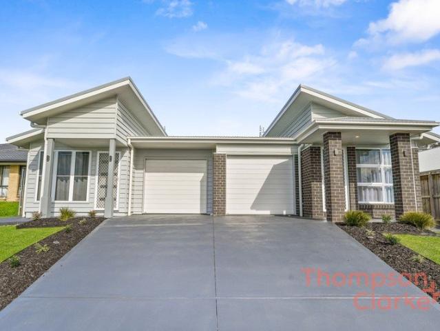 Effortless Living in a Modern Three Bedroom Duplex!