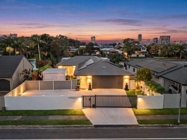 Effortless Waterfront Luxury with Burleigh Skyline Views