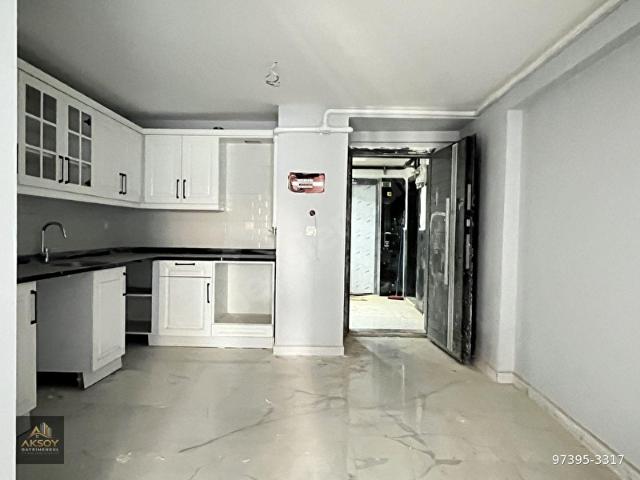 EKİNCİ CADDEYE 1BİNA YAKINI SATILIK AMERİKAN MUTFAKLI 1+1 60M2 KULLANIŞLI SIFIR FERAH BAHÇE KATI