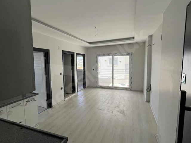 EKİNCİ GAYRİMENKUL`DEN KOZAN YOLU ÜZERİNDE 2+1 DAİRE