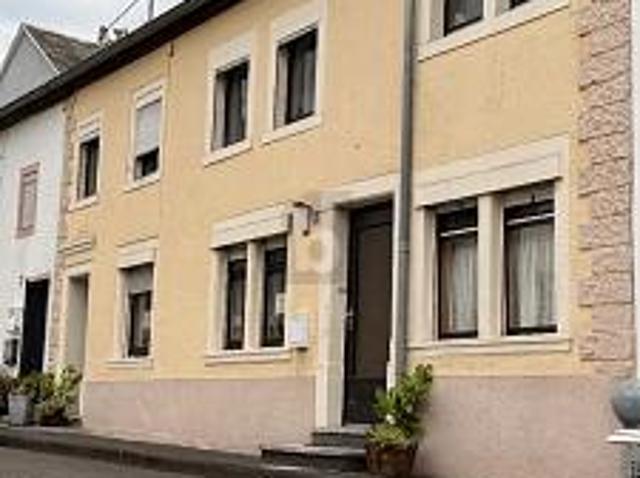 EHEMALIGES WOHN UND GESCHÄFTSHAUS