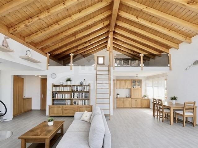 EINZELHAUS MIT AUSSICHT AUF DIE EINBÜNDIGE EINFACHHEIT
