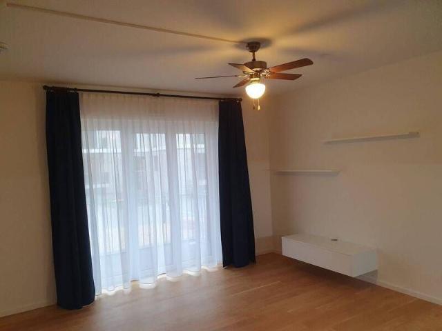 Einzimmerwohnung in nagelneuem, sehr ruhigen Wohnquartier, inklusive hochwertiger Einbauküche, Balkon, Fußbodenheizung, Wäschetrockner.