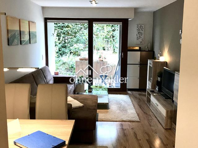 Einziehen und wohlfühlen! Gemütliche Wohnung mit überdachter Terrasse, EBK & Einzelstellplatz