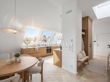 Einzigartige Dachgeschosswohnung mit herrlicher Süd Dachterrasse zum ruhigen und grünen Innenhof