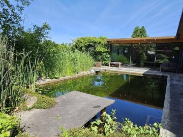 Einzigartiges Wohn und Seminarhaus in Dornbirn mit großem Grundstück, Schwimmteich und Spa Bereich!