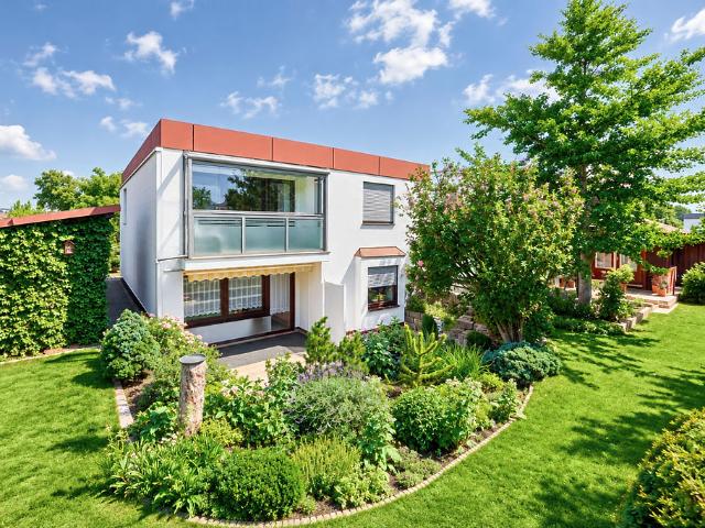 Südgarten, Kamin & Einliegerwohnung – draußen kleine Abenteuer, drinnen große Familienmomente!