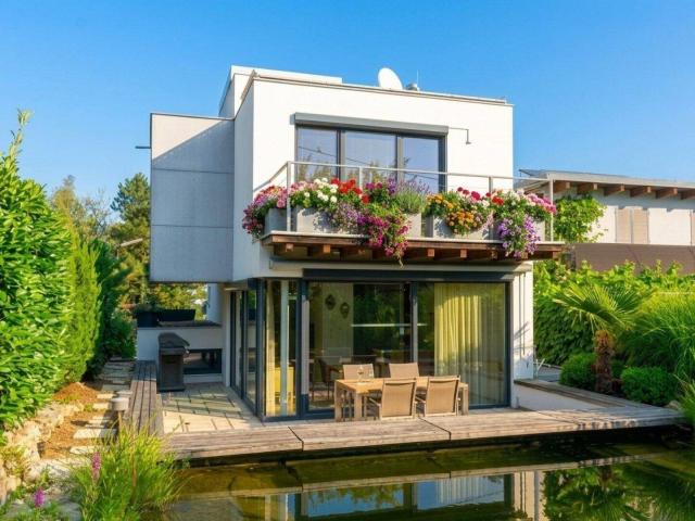 Ein Architektenhaus, das begeistert – Außergewöhnliches Juwel mit Fernblick am Schafberg