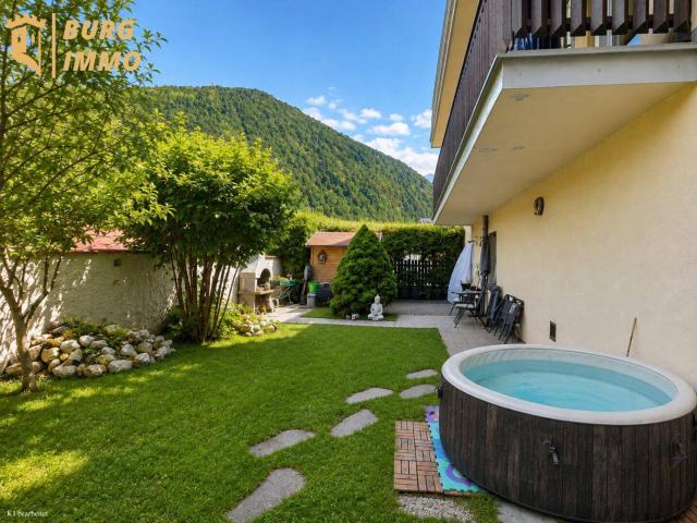 Ein Ort zum Wohlfühlen – 3 Zimmer Wohnung mit sonnigem Garten, Bergblick und eigenem Parkplatz