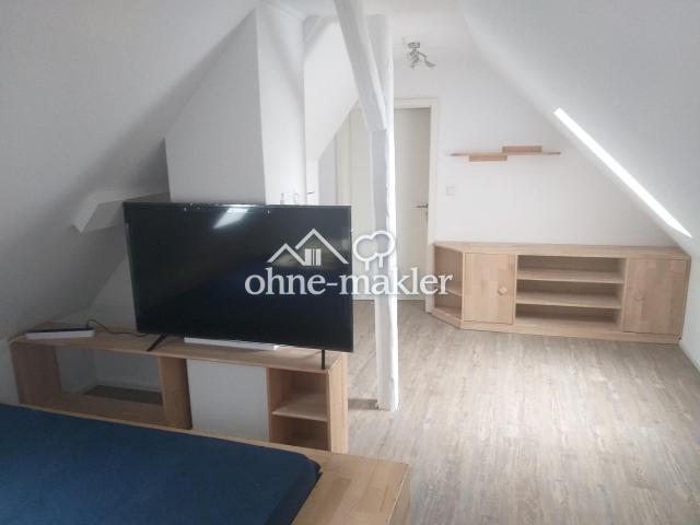 Ein möbliertes Zimmer in einer Wohngemeinschaft WG
