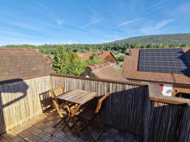 Ein neu isoliertes Gebäude mit Ihrer Dachterrasse