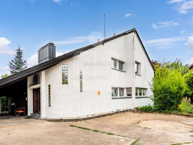 Ein verborgenes Juwel im Grünen außergewöhnliches Wohnhaus mit viel Privatsphäre