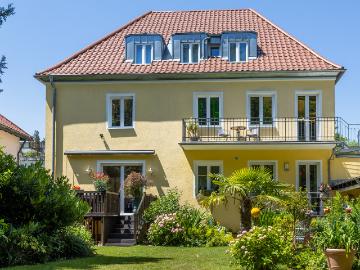 Ein zauberhaftes und vielseitiges Haus in Spitzenlage direkt am Grüngürtel und Engl. Garten
