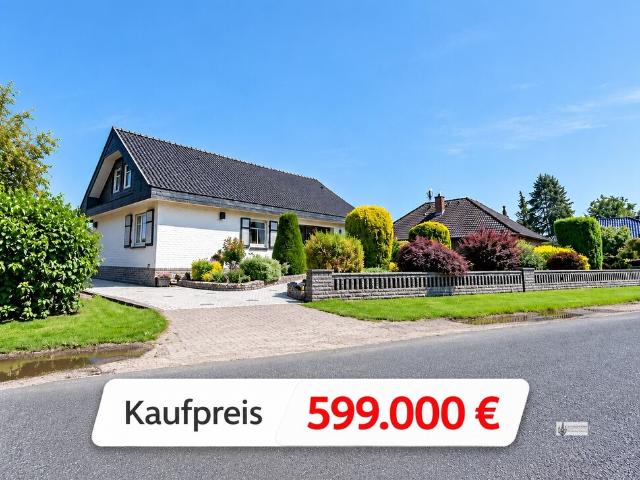 Ein Zuhause zum Verlieben Repräsentatives Einfamilienhaus mit traumhaftem Garten, Wellness + Garage