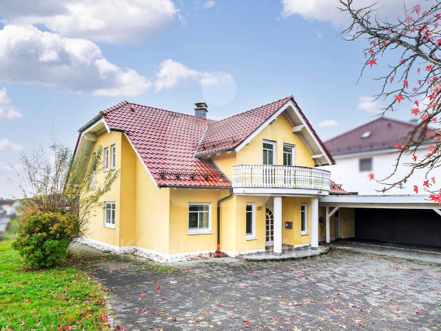 Ein Zuhause, das begeistert Traumhafte Lage, weitläufiger Ausblick und stilvolle Wohnqualität!