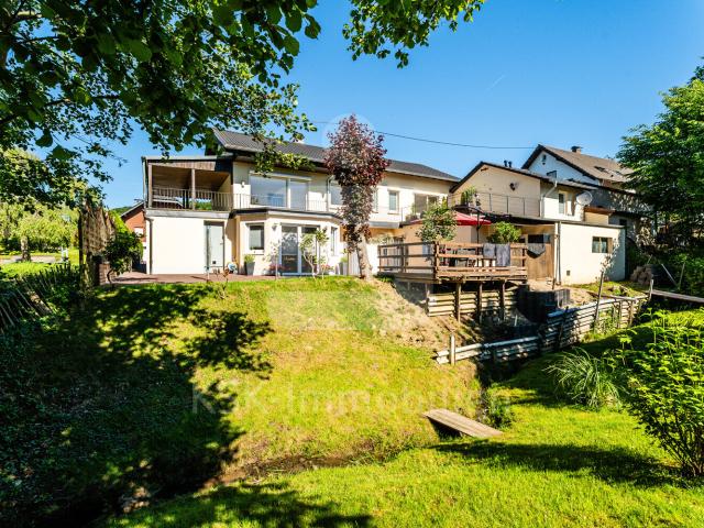 Ein Zuhause mit Mehrwert. Einfamilienhaus mit Apartment, Fernblick und vielen Modernisierungen