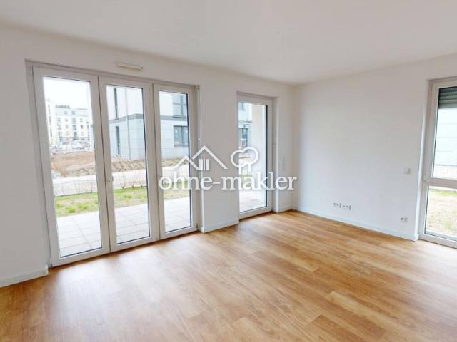 Ein Zuhause mit Stil: 3 Zimmer Terrassenwohnung mit Mietergarten und Einbauküche!
