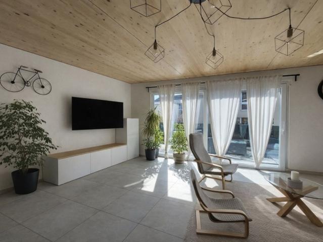 Eine atemberaubende moderne 4,5 Zimmer Wohnung mit Terrasse, Innenparkplatz und Außenparkplatz