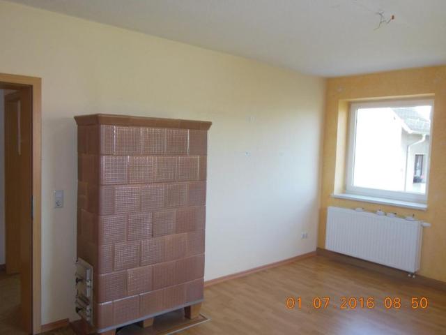 Eine attraktive 3 RW, EG mit EBK, Garage, PKW Aussenstellplatz, Kellerabteil & eigenem Gartenanteil!
