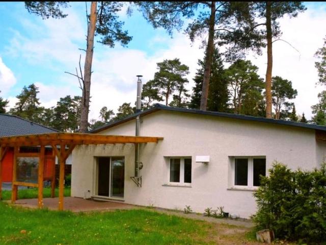 Einfamilienhaus Bungalow mit Erdwärme Terrasse und Garage