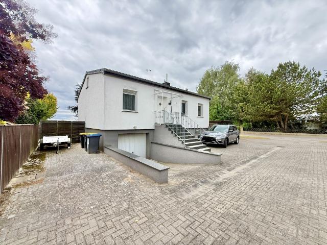 Einfamilienhaus im Bungalowstil und Vollkeller Zehlendorf