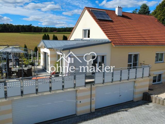 Einfamilienhaus in unverbaubarer Randlage auch als Mehrgenerationenhaus nutzbar. 3 Wohneinheiten