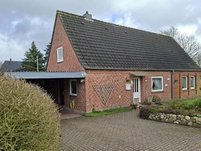 Einfamilienhaus mit großem Grundstück und zusätzlichem Baupotenzial in Ladelund