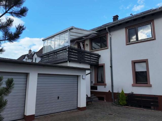 Einfamilienhaus mit Einliegerwohnung, Garten, Garage, Terrasse !