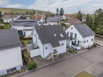 Einfamilienhaus mit Einliegerwohnung, Wärmepumpe, PV & stabilen Mieteinnahmen