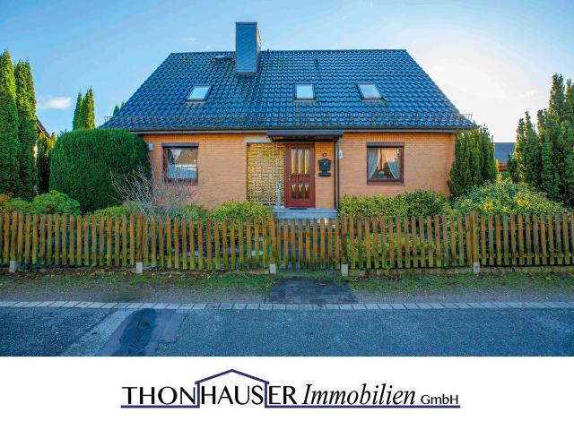 Einfamilienhaus mit Einliegerwohnung und weiterem Baugrundstück in 22946 Trittau