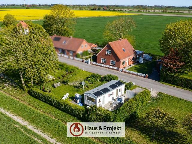 Einfamilienhaus mit Einliegerwohnung und zusätzlichem Grundstück