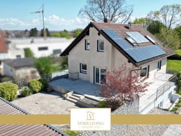 Einfamilienhaus mit ELW + genehmigter Gewerbefläche mit 4 Garagen, Traumgarten + großen Terrassen