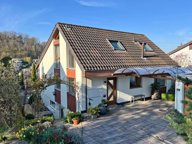 Einfamilienhaus mit Garten, Teich und viel Raum zum Leben – ruhig gelegen in Münchenstein