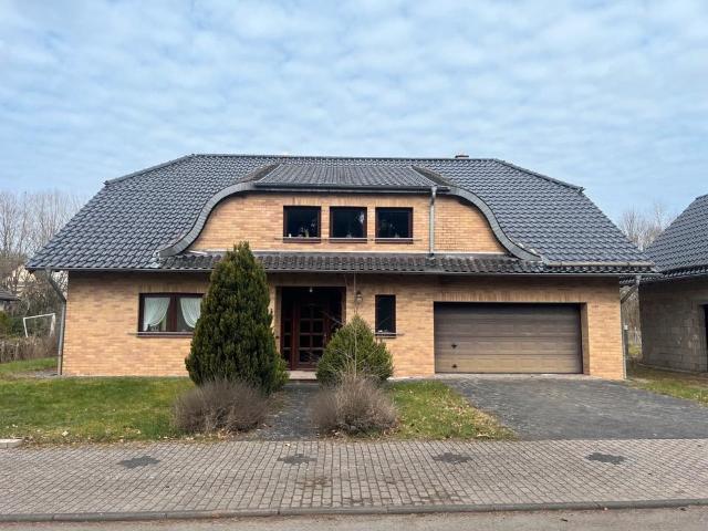 Einfamilienhaus mit großem Grundstück