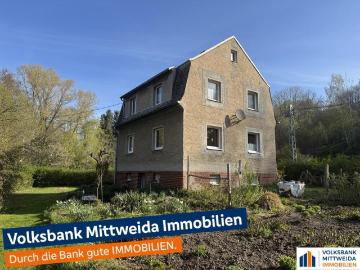Einfamilienhaus mit großem Grundstück und Doppelgarage in ruhiger Lage!