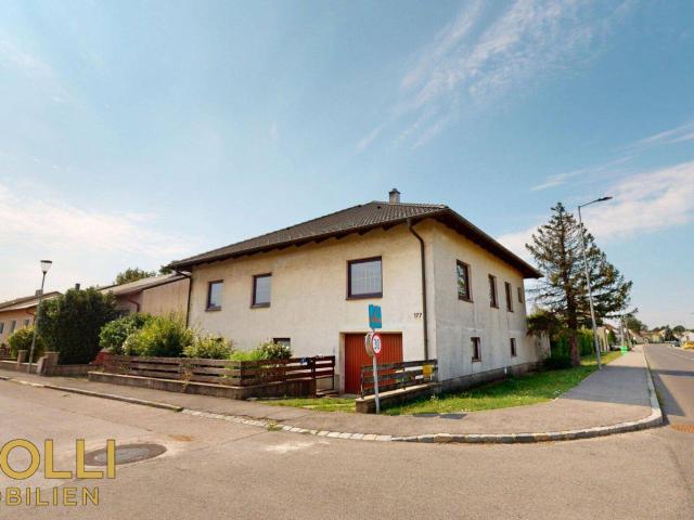 Einfamilienhaus mit großzügigem Eckgrundstück und Garagenwerkstatt in Loimersdorf
