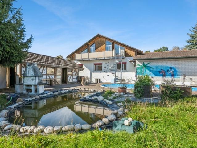 Einfamilienhaus mit grosszügigem Grundstück & vielseitigen Nutzungsmöglichkeiten