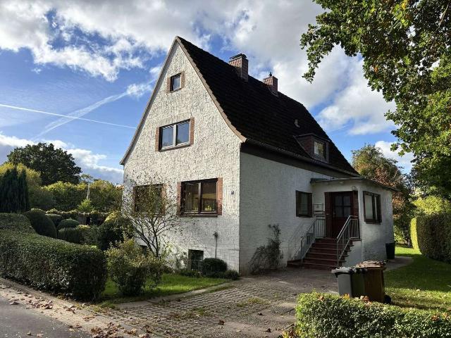 Einfamilienhaus mit idyllischem Garten und vielfältigen Möglichkeiten