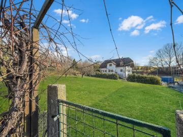 Einfamilienhaus mit unverbaubarem Ausblick inklusive Baugrundstück